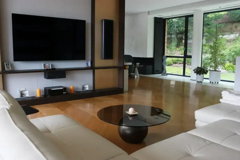 Modern living room interior completed through project management and finishing construction services.